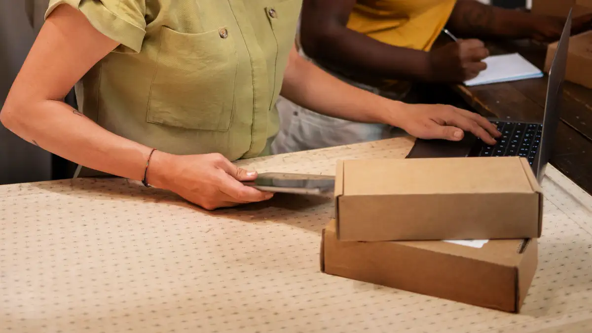 Illustrative photo of an online clothing store packing orders
